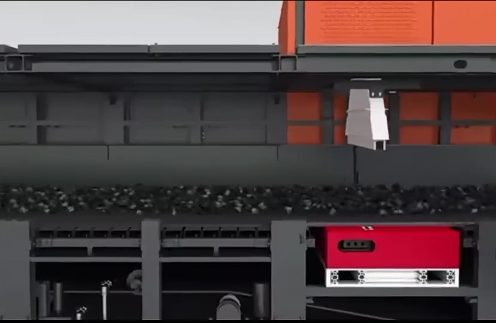 Ore in a single layer passing the scan head inside the sorter